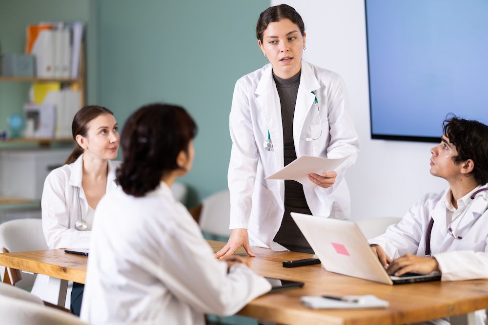 Medical Team Meeting in a Classroom, With One Doctor Presenting — Blue Stone Medical & Professional in West Rockhampton, QLD
