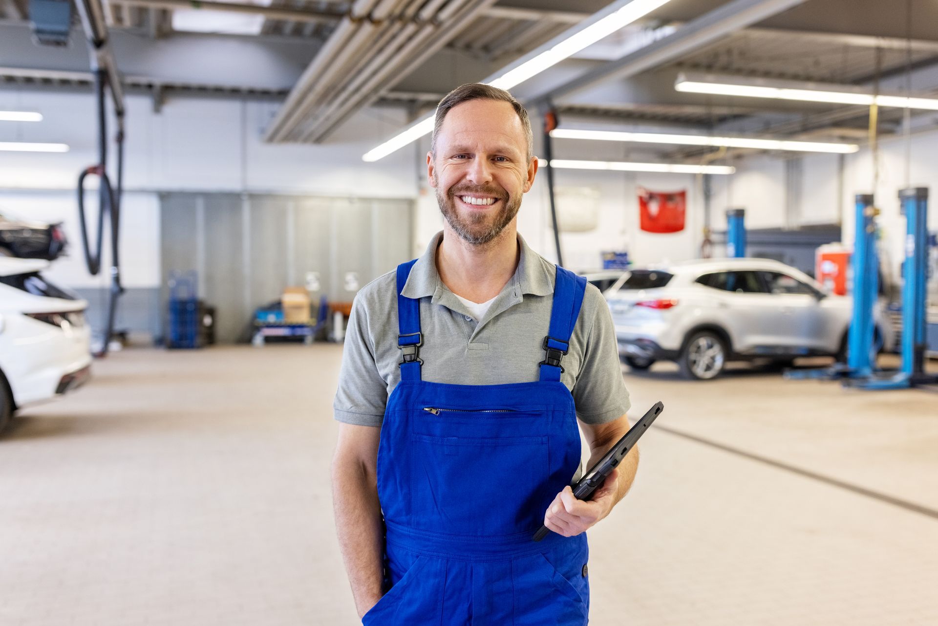 Mature auto mechanic working in auto repair shop providing expert vehicle maintenance services. — Milford, CT — Mattie’s Service Center