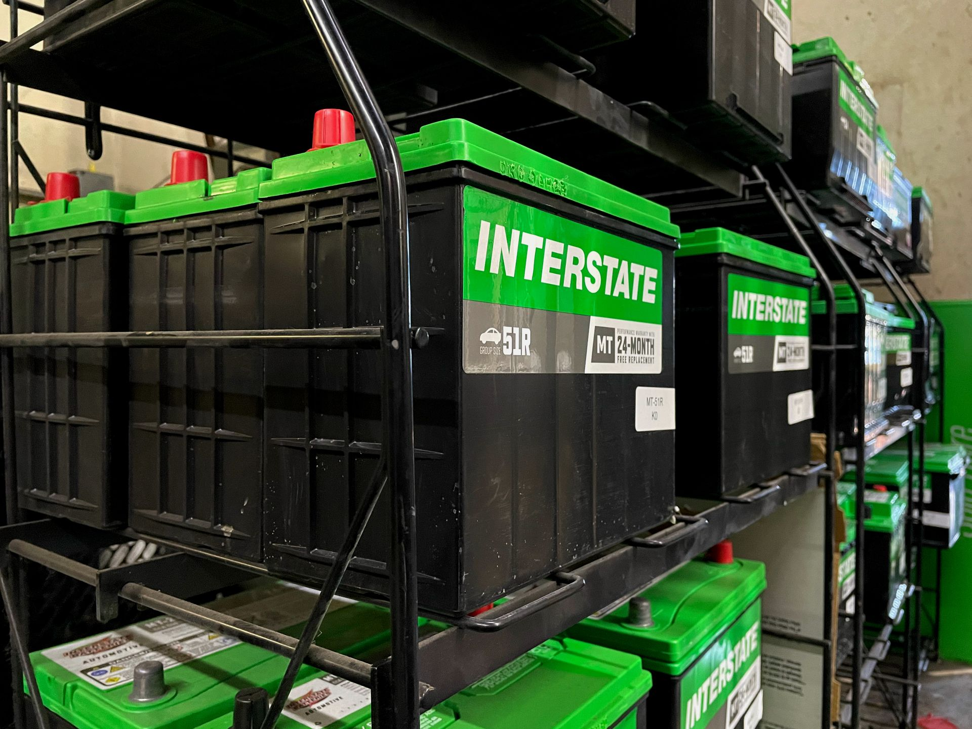 Here are some new interstate car batteries ready to be installed in a car or truck.