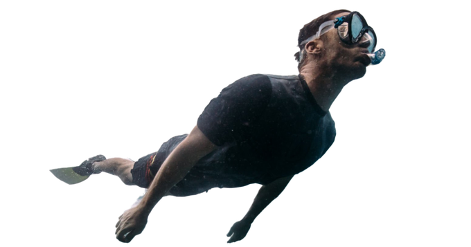 A man is swimming underwater wearing a mask and flippers.