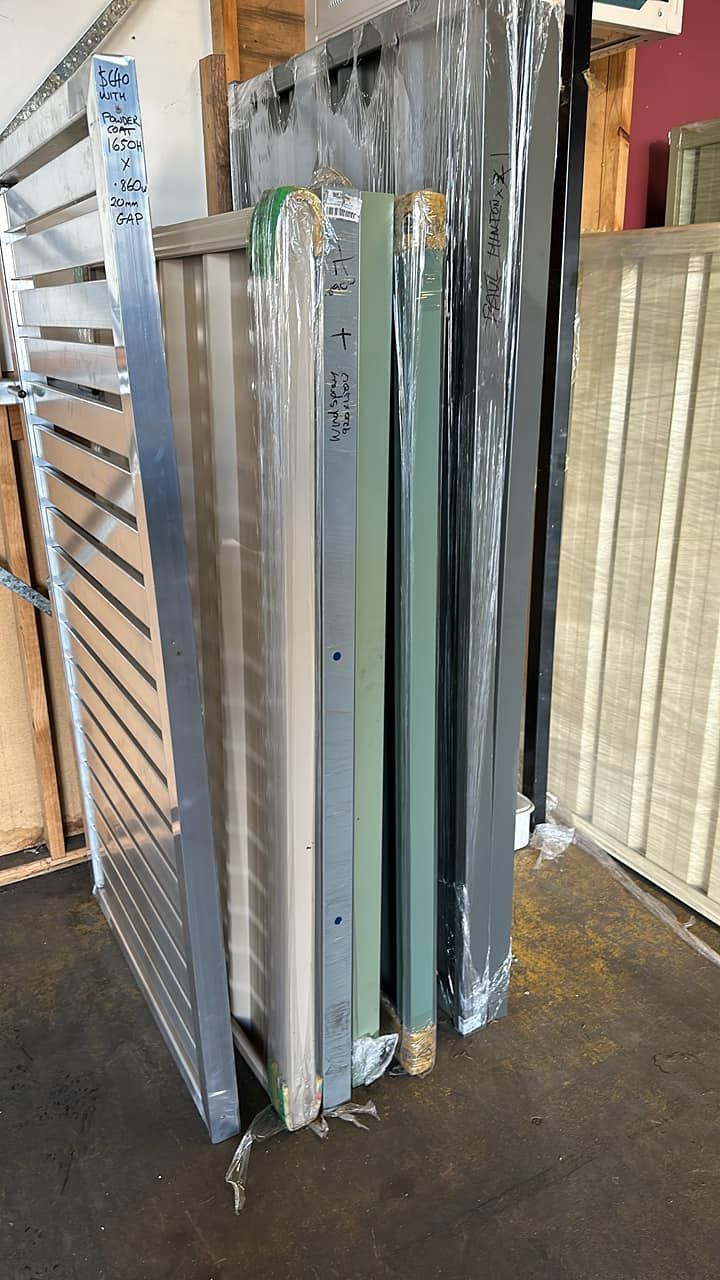 Various Metal and Green Frames and Filters, Stacked Vertically — Metal Fencing Supplies In Taree, NSW