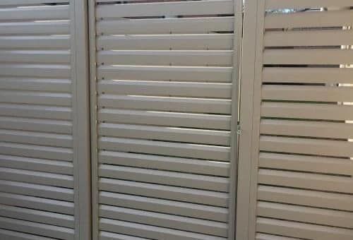 Three White Louvered Wooden Doors — Metal Fencing Supplies In Old Bar, NSW