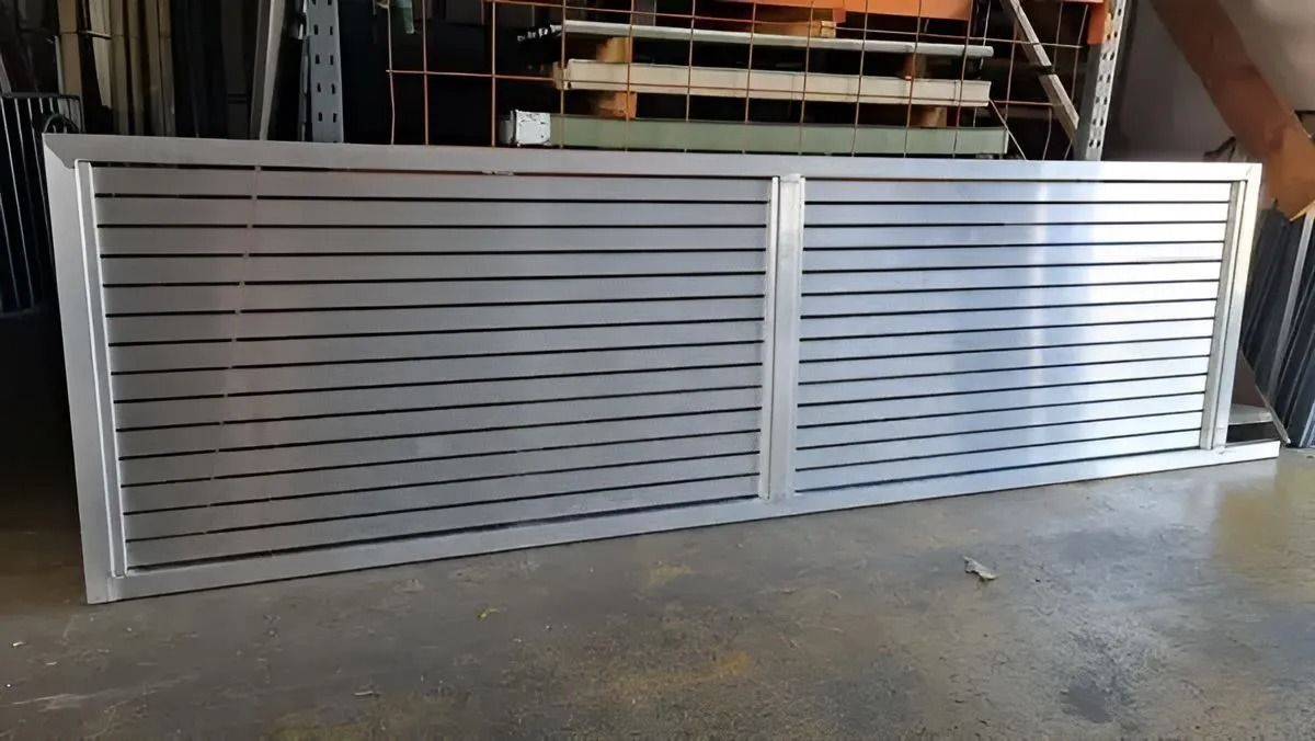 Silver Metal Sliding Gate With Horizontal Slats — Metal Fencing Supplies In Taree, NSW