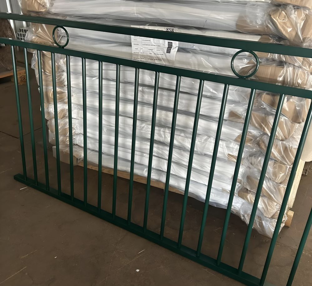 Green Metal Railing With Vertical Bars, Decorative Circles, and Horizontal Top — Metal Fencing Supplies In Harrington, NSW