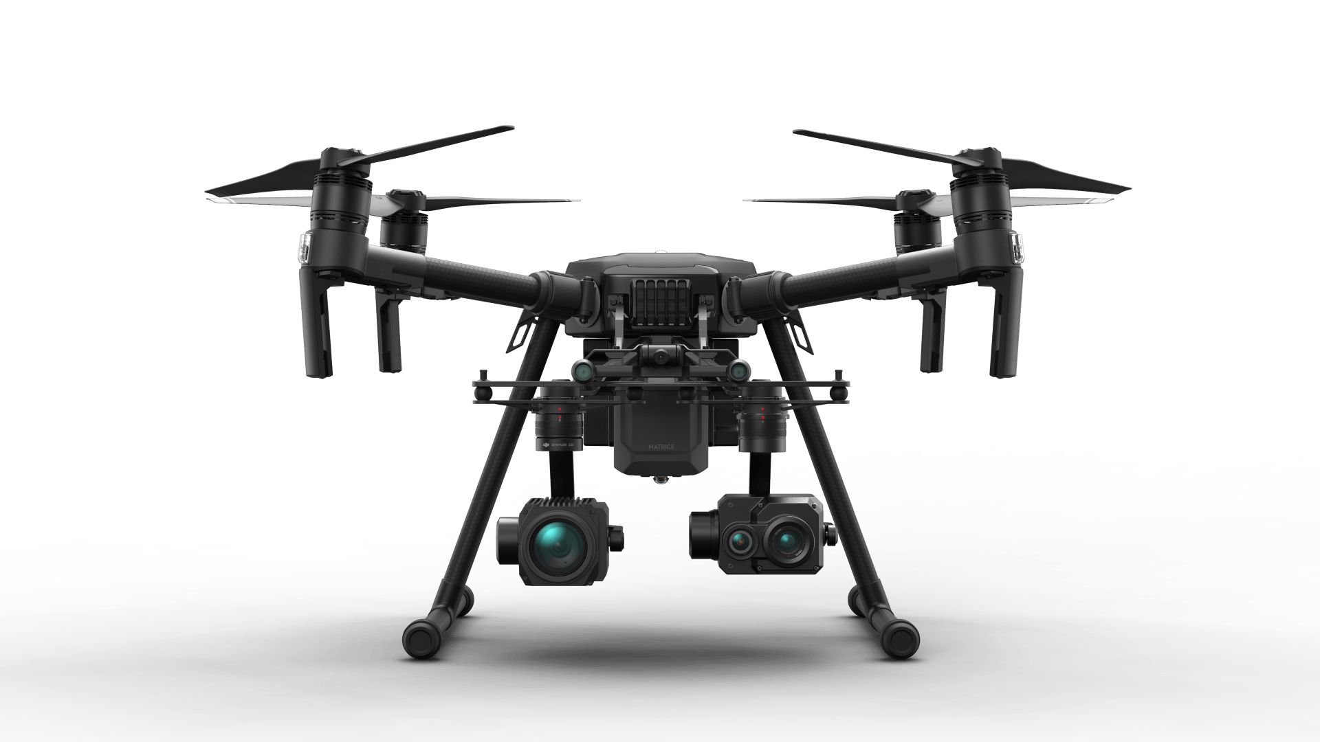 A black dual-camera drone is displayed on a white surface.