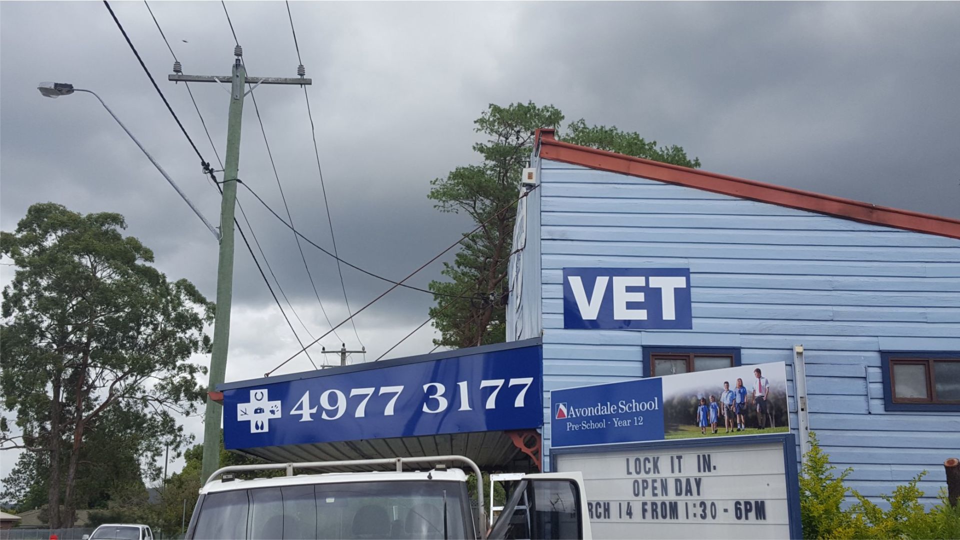 view of signage board installed on the building
