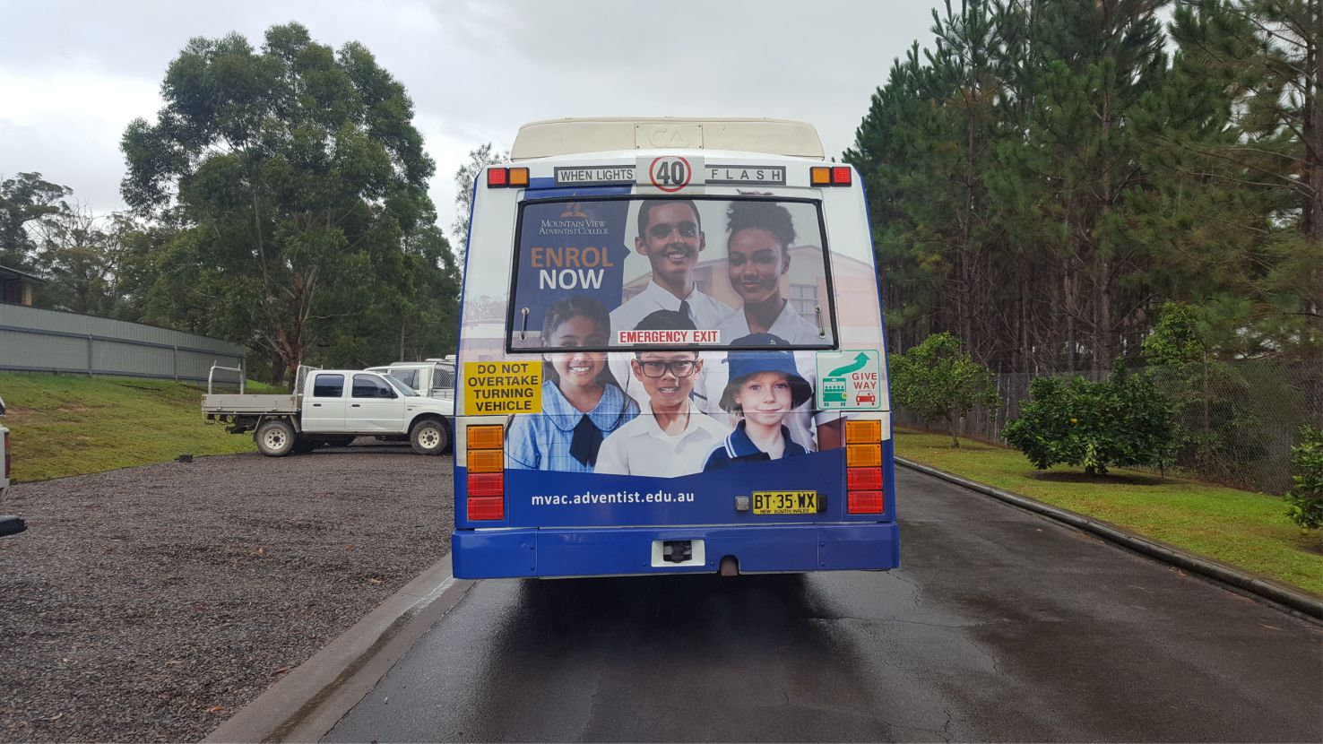 rear view of a bus with branding
