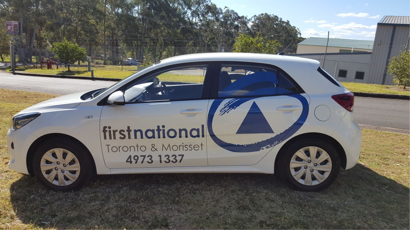 View of automobile with vehicle branding