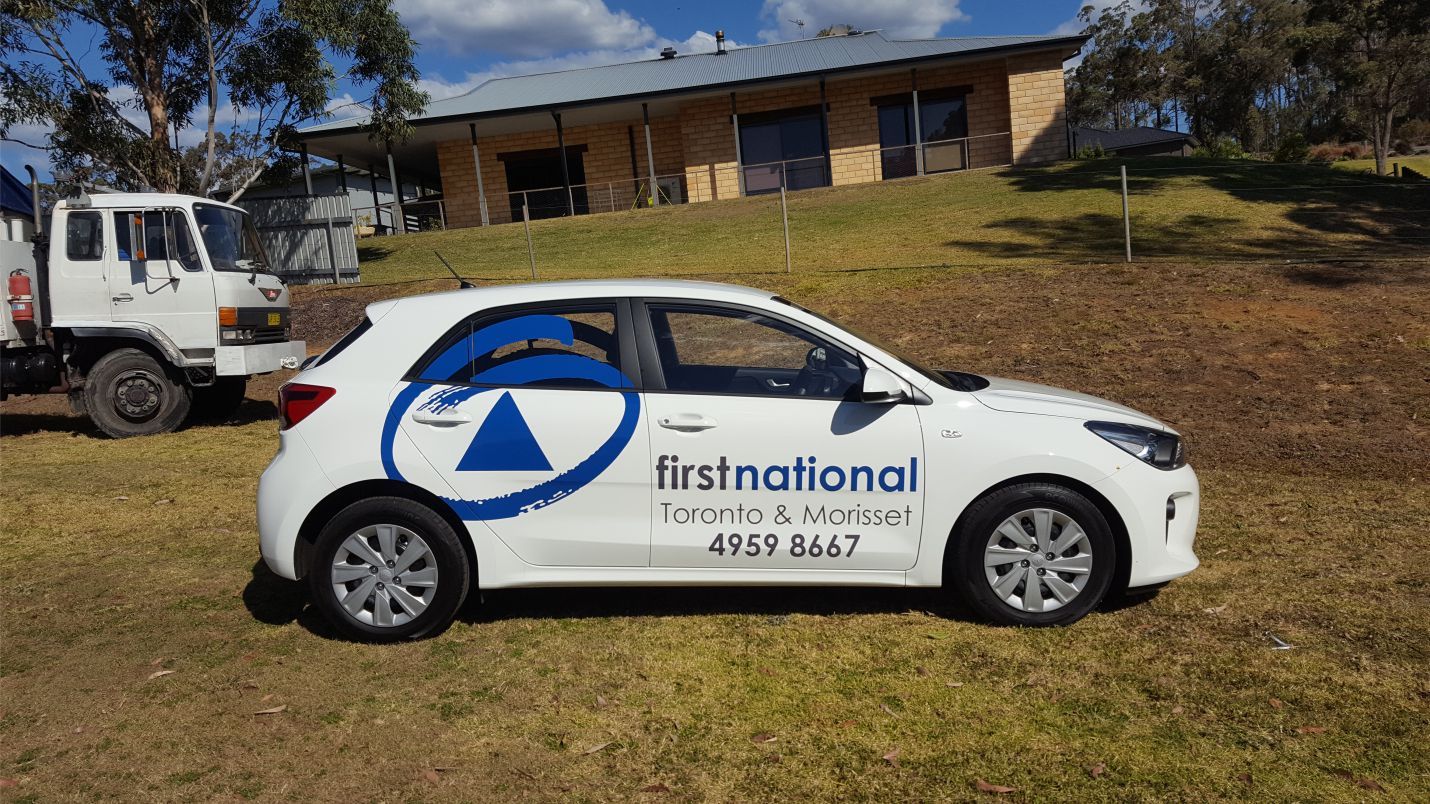 View of automobile with vehicle branding