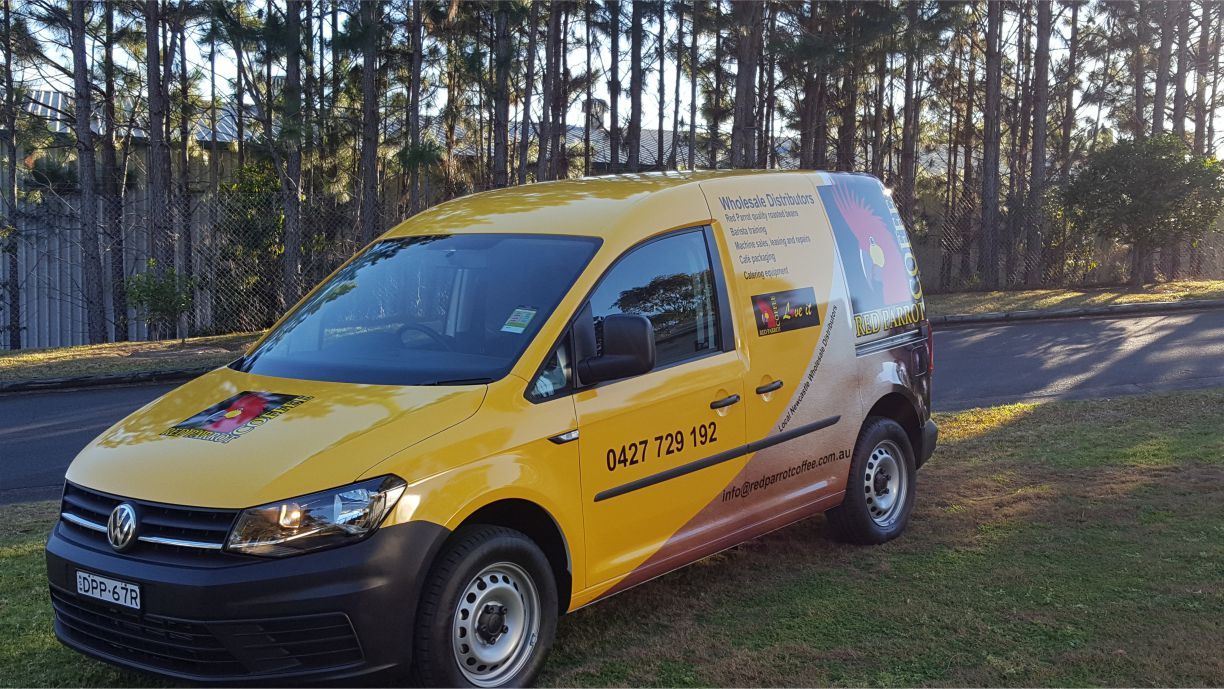 Side view of an automobile with vehicle branding