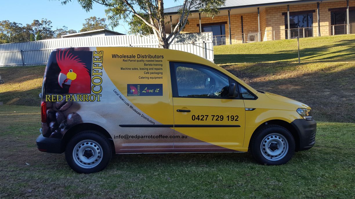Side view of an automobile with vehicle branding