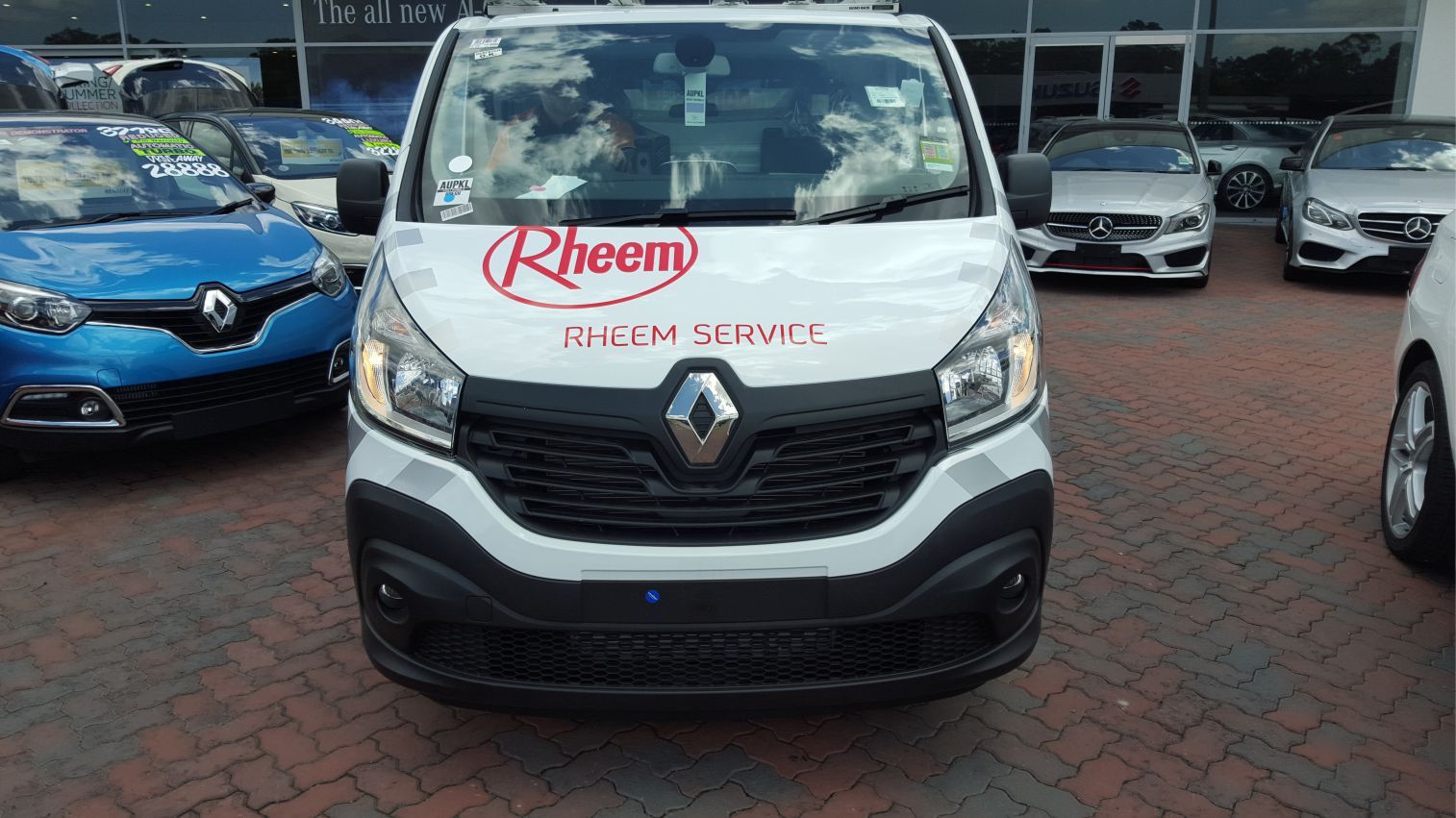 view of an automobile with printed vehicle branding