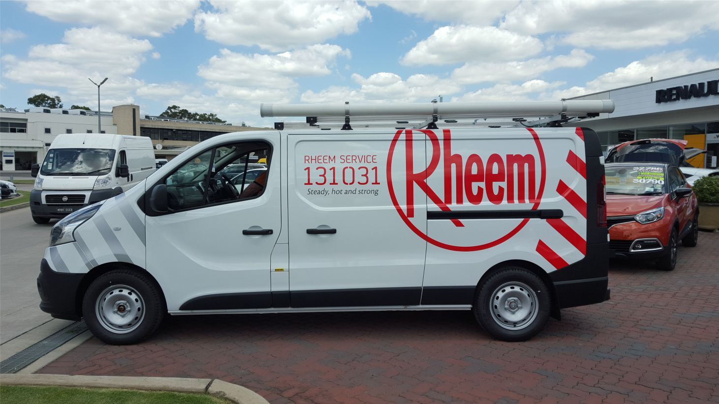 view of an automobile with printed vehicle branding