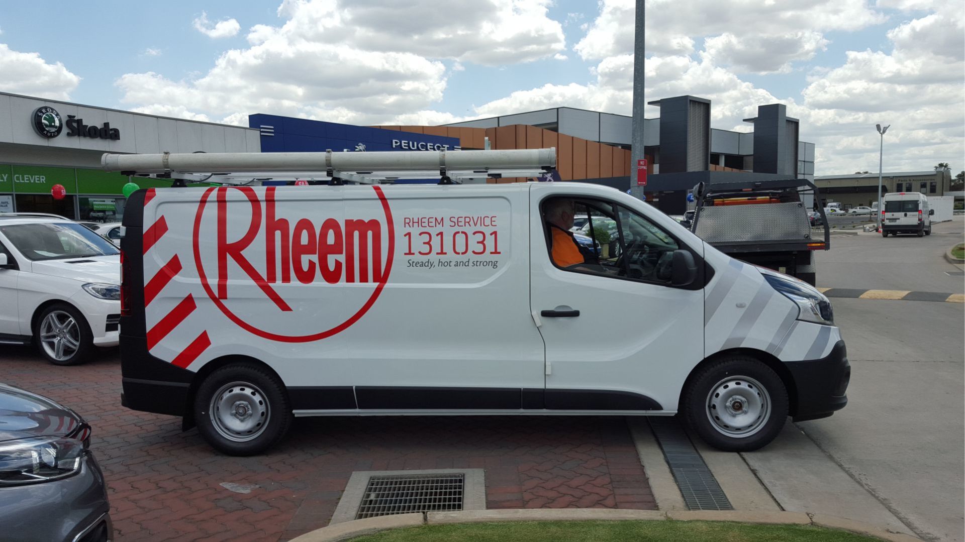 view of an automobile with printed vehicle branding