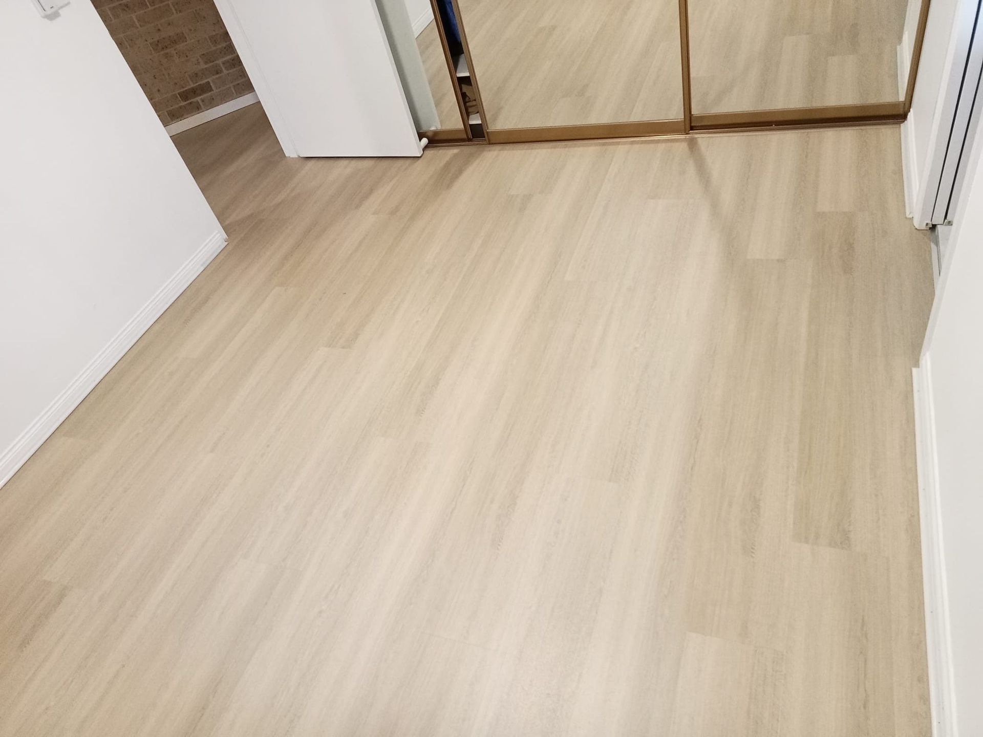 Light-Colored Wood Flooring in a Room — BLB Flooring Solutions in Maitland, NSW