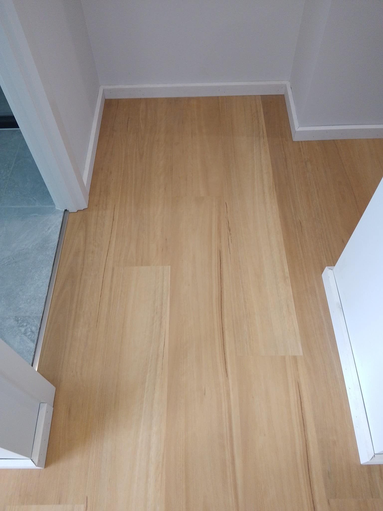 Light-Colored Wooden Floor in a Room — BLB Flooring Solutions in Newcastle, NSW
