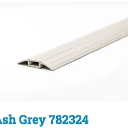 Floor Transition Strip Between Gray Carpet and Wood Flooring — BLB Flooring Solutions in Central Coast, NSW