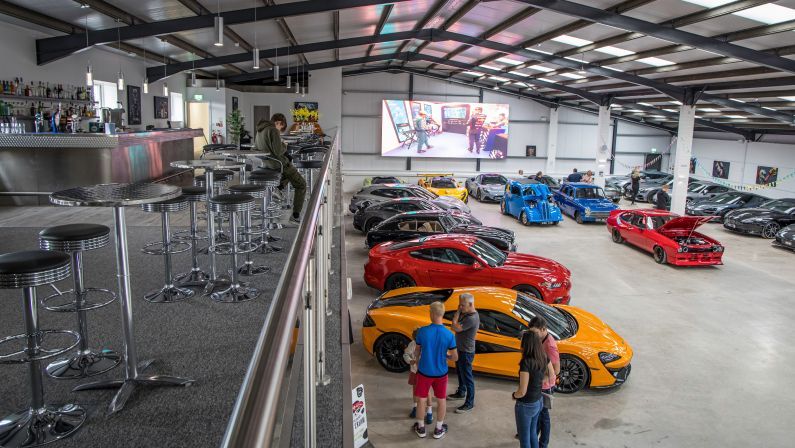 Bradford-on-Avon, UK- August 28, 2023: Supercars Storage Unit full of exotic spots and supercars.