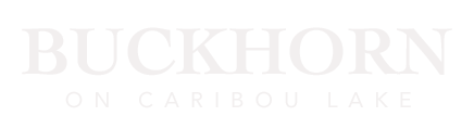 A white logo for buckhorn on caribou lake on a white background.