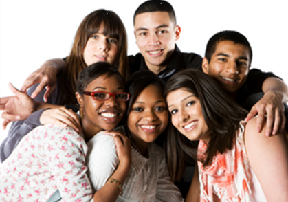 Group of six diverse young adults smiling, arms around each other, against a white background.