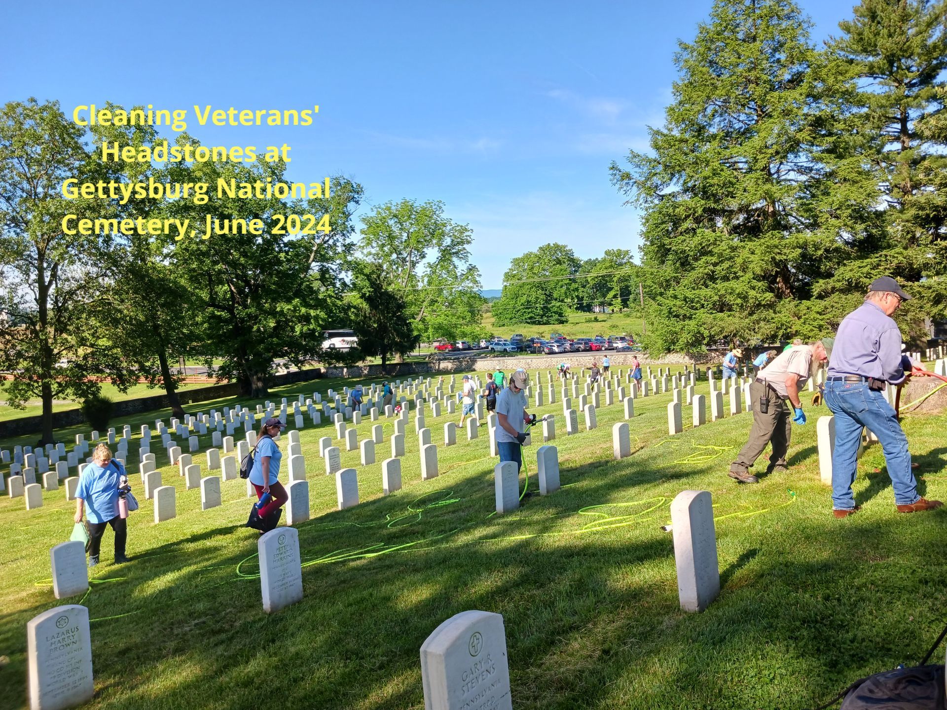 Cleaning grave markers at Gettysburg National Cemetery
