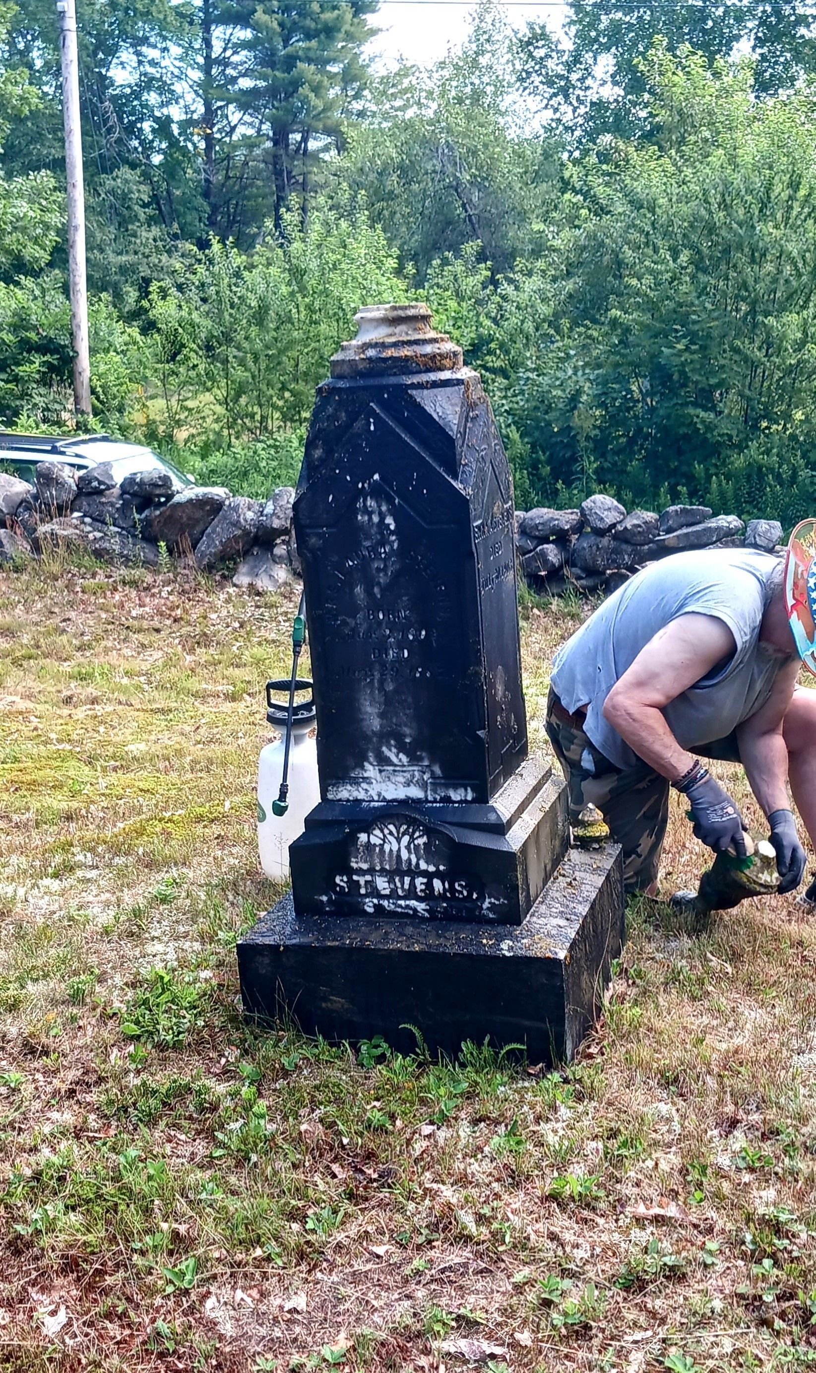 Blackened monument with broken finial