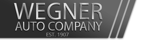 A black and white logo for wegner auto company