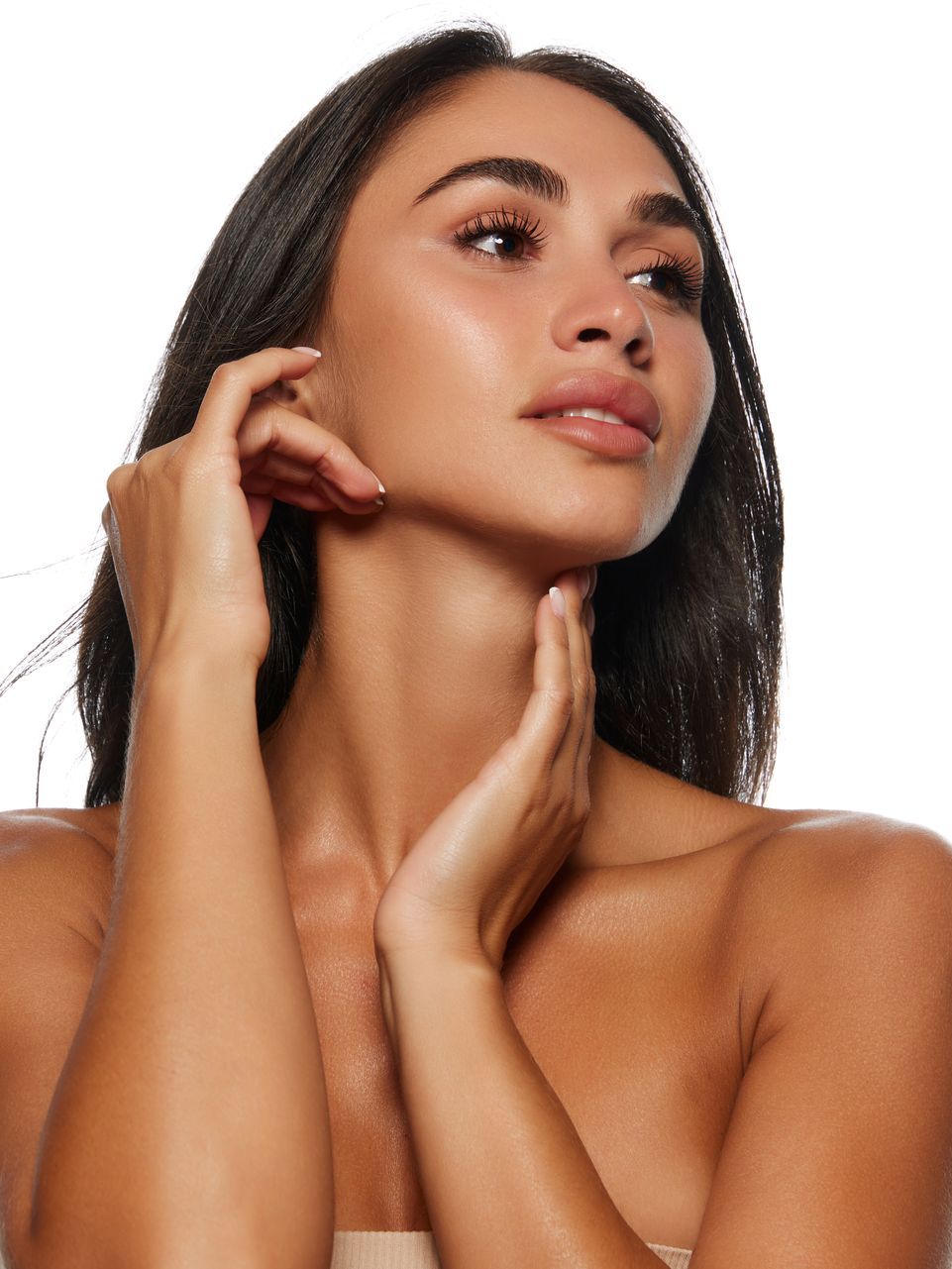 a woman touching her face