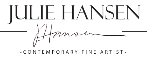 The signature of julie hansen is shown on a white background.