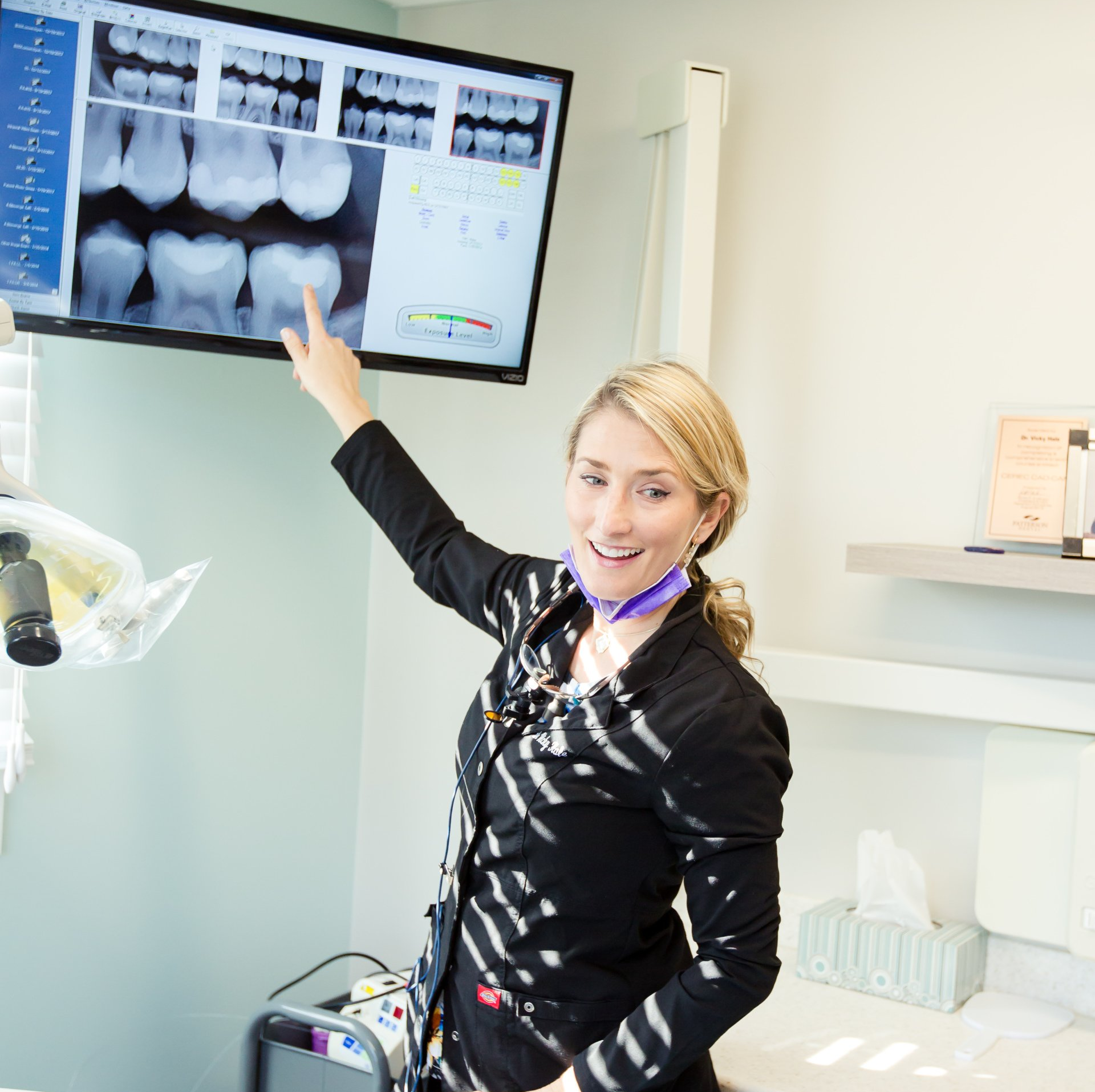 Dentist reviewing digital x-ray