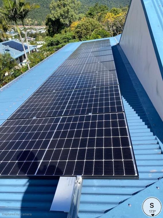 A Roof With Solar Panels On It  — Solar Power Whitsunday In Cannonvale, QLD