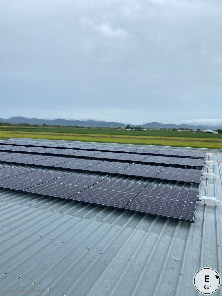There Are Many Solar Panels on the Roof of a Building — Solar Power Whitsunday In Proserpine, QLD