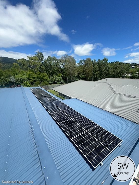 A House With Solar Panels On The Roof — Solar Power Whitsunday In Cannonvale, QLD