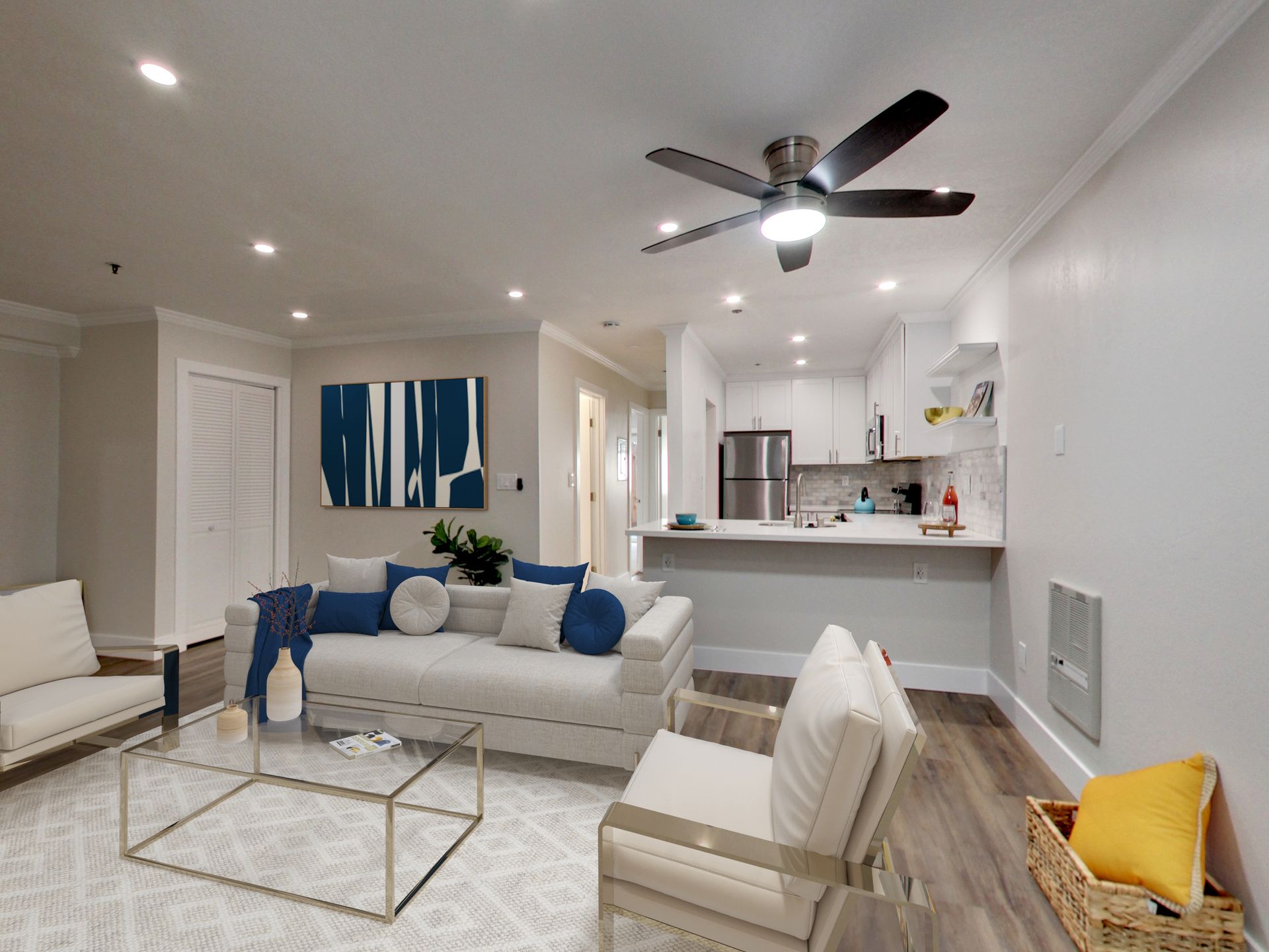 modern living room with a sofa, coffee table, bench, chair, tv and onlooking to a patio