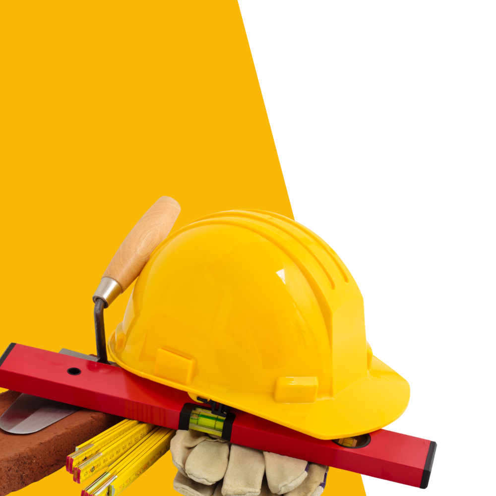 A yellow hard hat is sitting on top of a red level