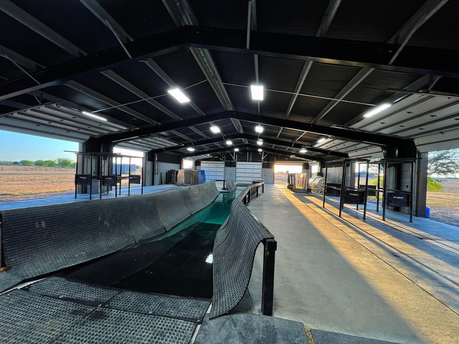 A large building with a large pool in the middle of it.