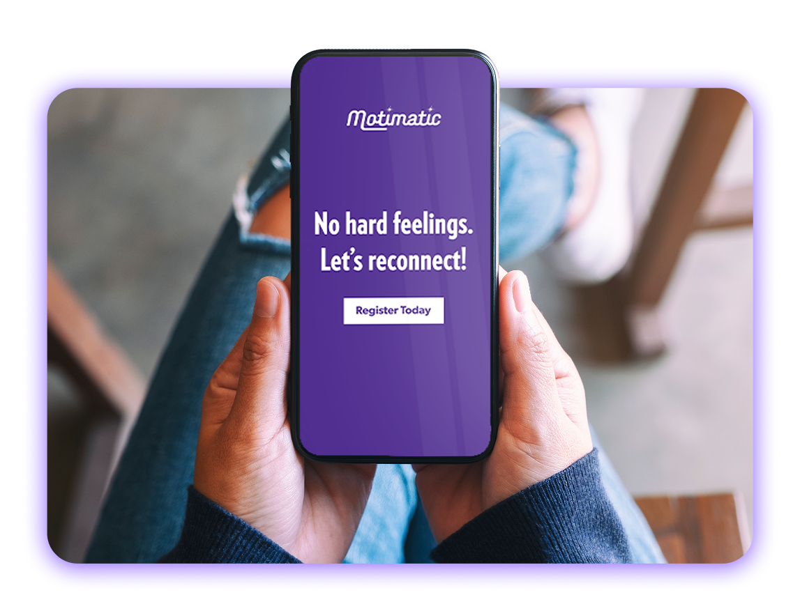 Person holding a phone with a Motimatic ad on it