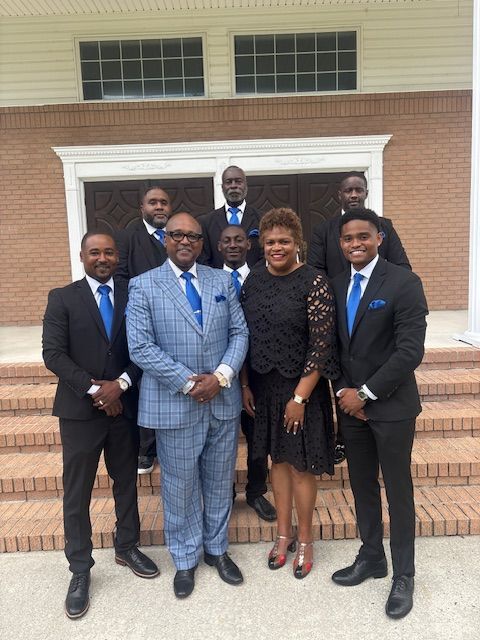 A church with a cross on the front of it