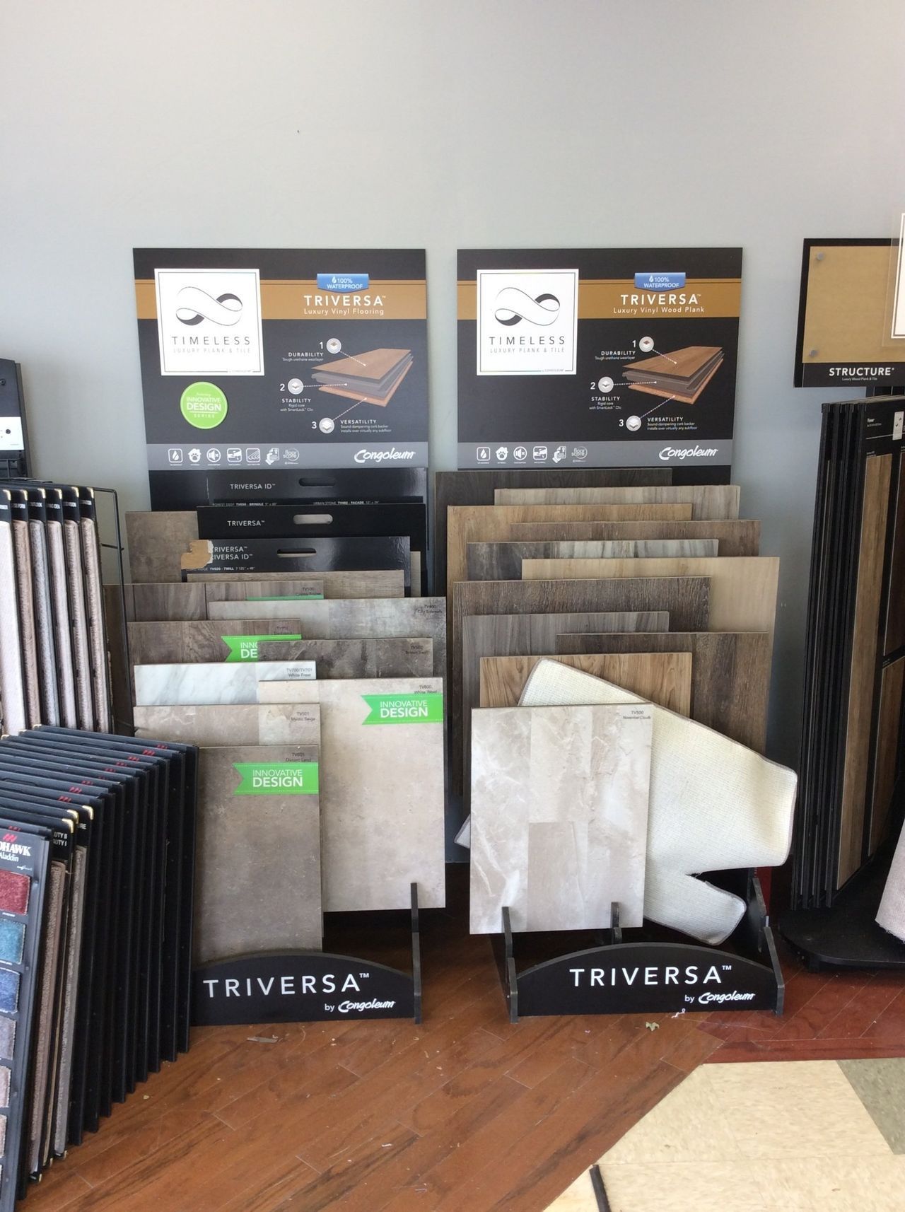Stacks Of Vinyl And Hardwood Floor Tiles — Clifton, NJ — Suba Flooring and Carpet