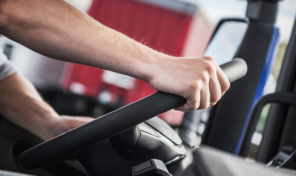 Hand On Truck Steering Wheel — Hot Springs, AR — Malone Tax & Bookkeeping