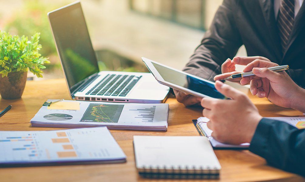 Business People Are Analyzing And Planning Business — Hot Springs, AR — Malone Tax & Bookkeeping