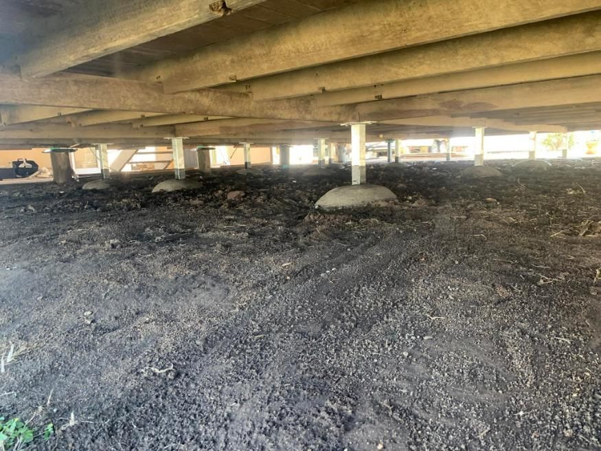 A Picture of The Underside of A Wooden Deck — Get Stumped Stumping & Maintenance In Ayr, QLD