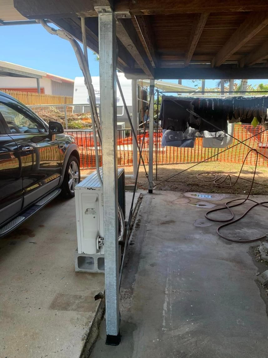 A Car Is Parked Under a Covered Area in A Garage — Get Stumped Stumping & Maintenance In Bowen, QLD