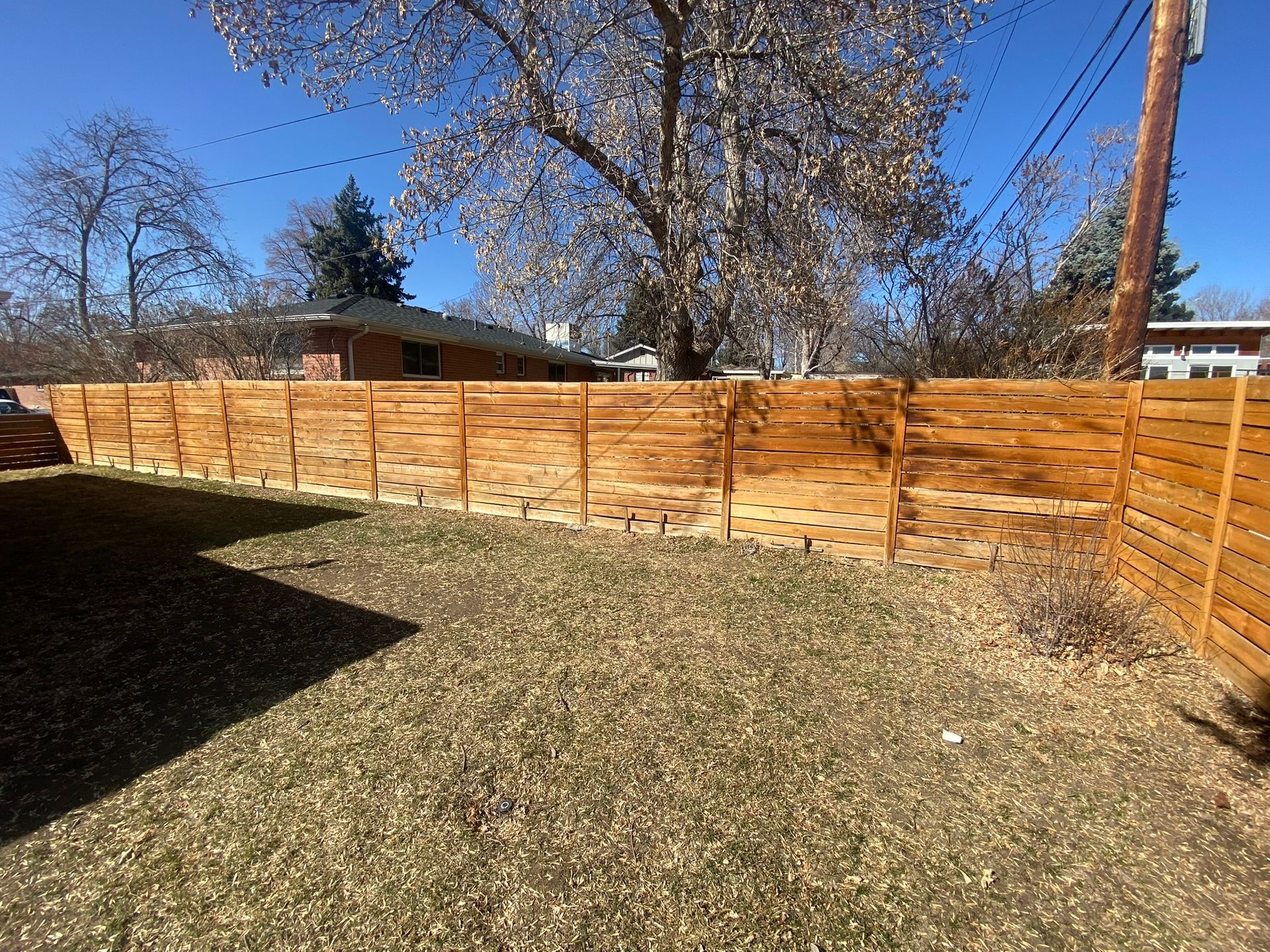 Horizontal Cedar fence far