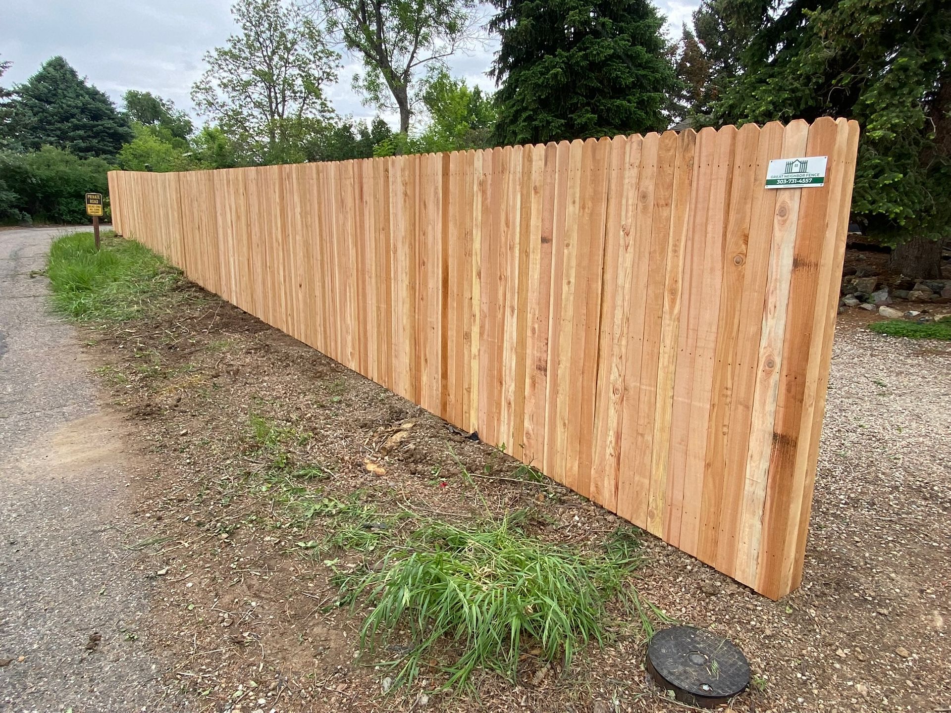 Long run of cedar privacy fence