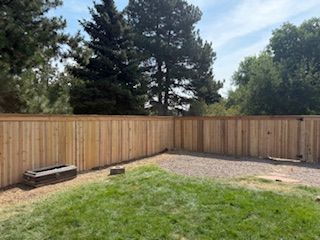corner of privacy fence with top rail from left side