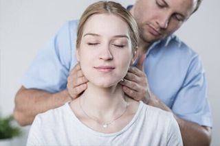 Woman having her neck massaged - Chiropractic in Sioux Falls, SD