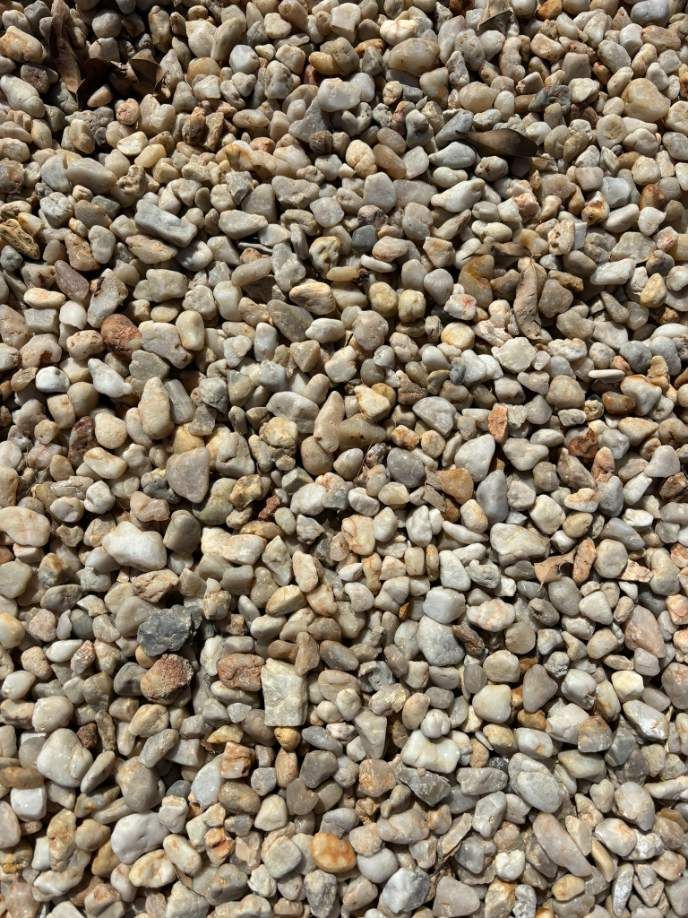A Pile Of Gravel Is Sitting On The Ground — McCahills Earthmoving & Landscaping Supplies In Stuart, QLD