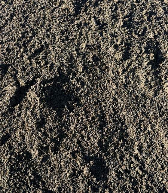 A Close Up Of A Pile Of Dirt On The Ground — McCahills Earthmoving & Landscaping Supplies In Stuart, QLD