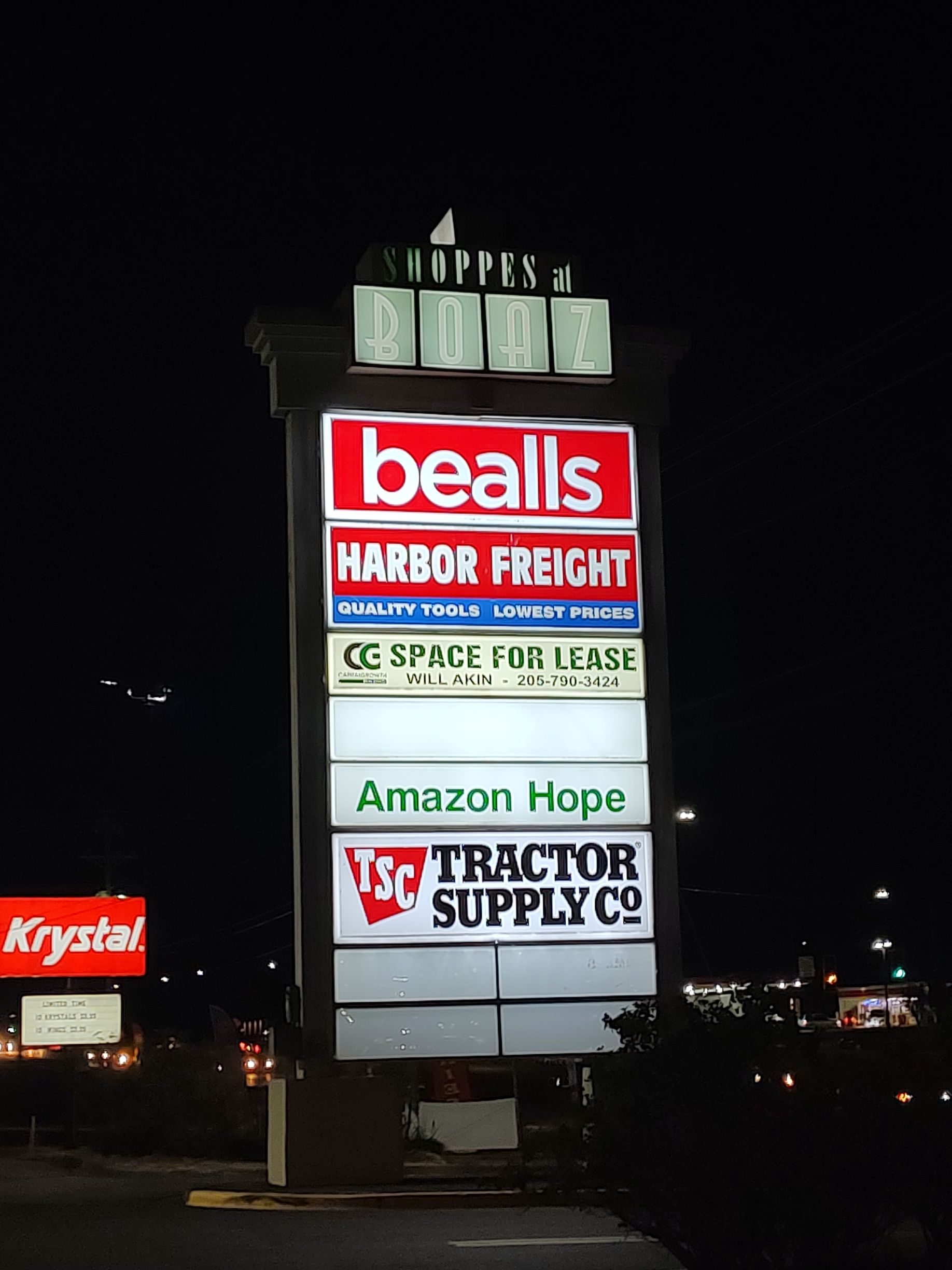 A sign for bealls harbor freight amazon hope and tractor supply co.
